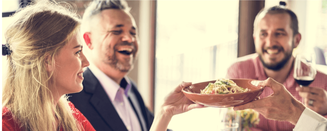 People Eating Food in a Restaurant