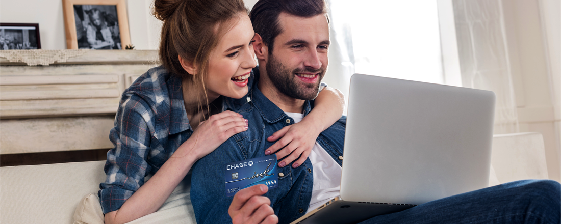 Woman and man are happy with a new Chase Credit card