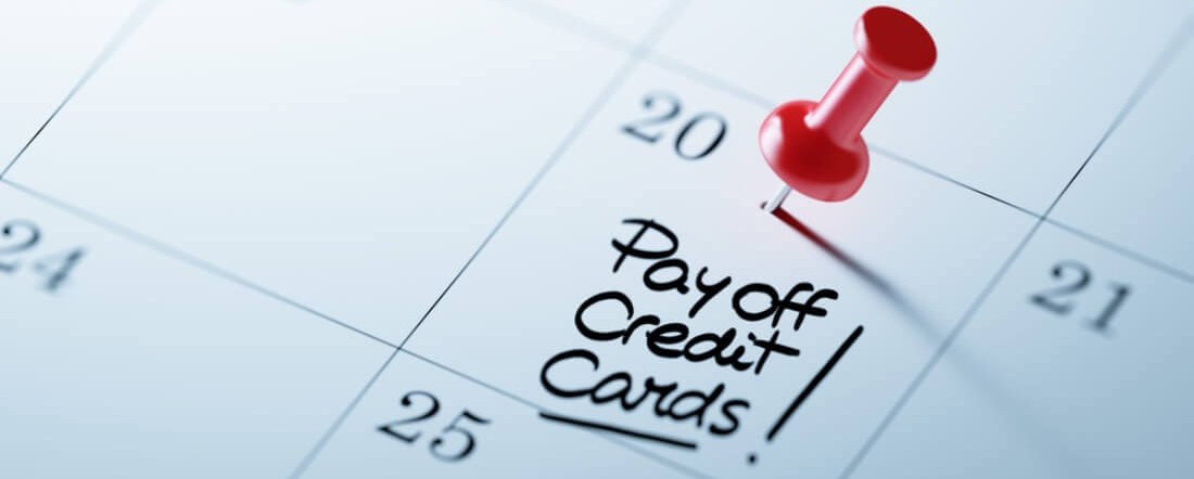 there is a calendar with checked due date for paying off credit cards