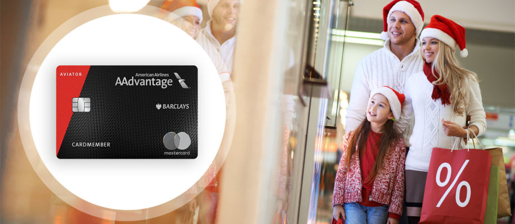 shows aadvantage credit card with family wearing sweaters and santa's hats 